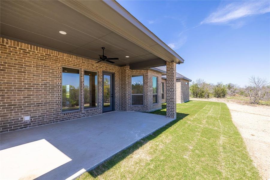 View of patio with ceiling fan