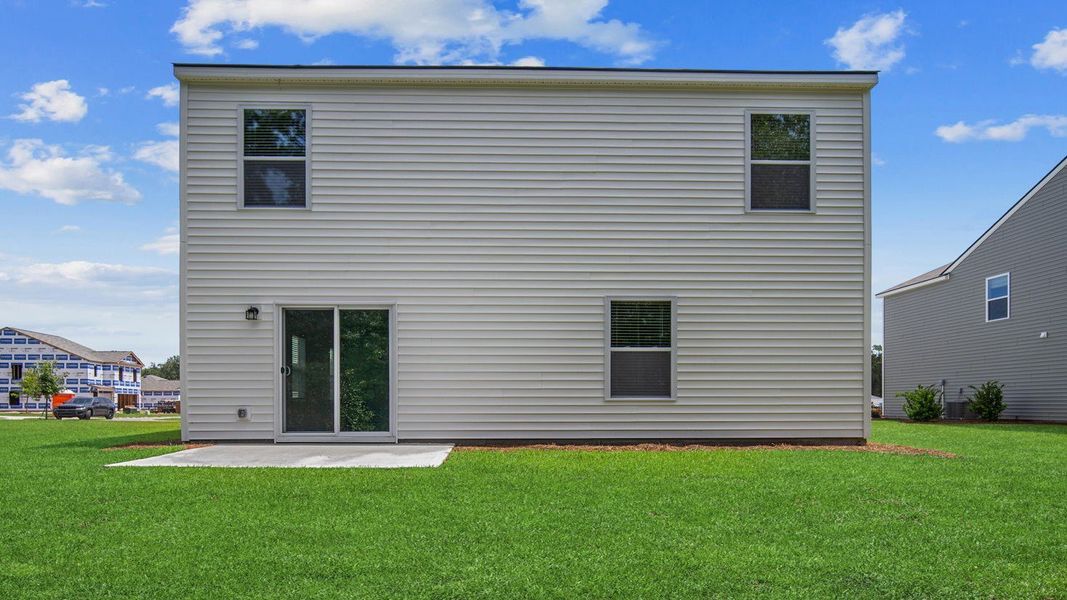 Front exterior of a new home in The Retreat at East Argent, Ridgeland, SC, highlighting curb appeal (Image 24).