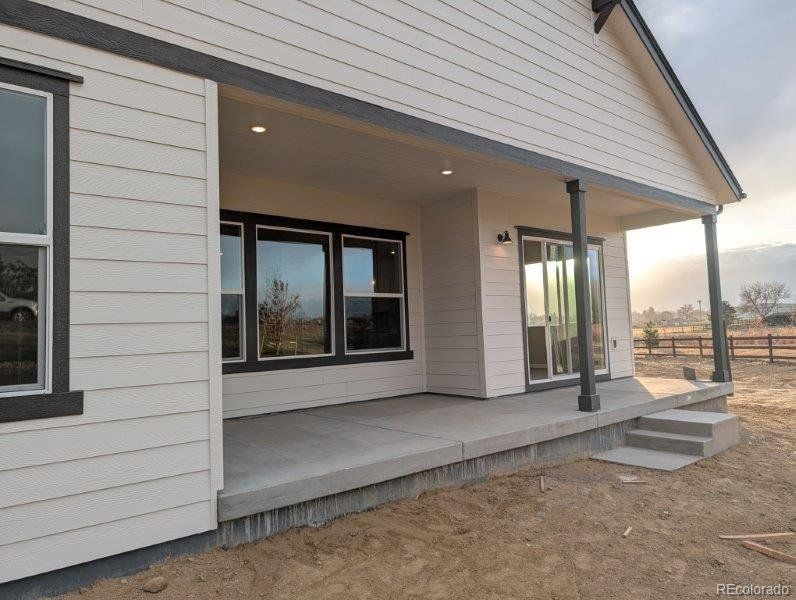 Exterior details and patio area of a home in Highlands Preserve, Mead (Image 3).