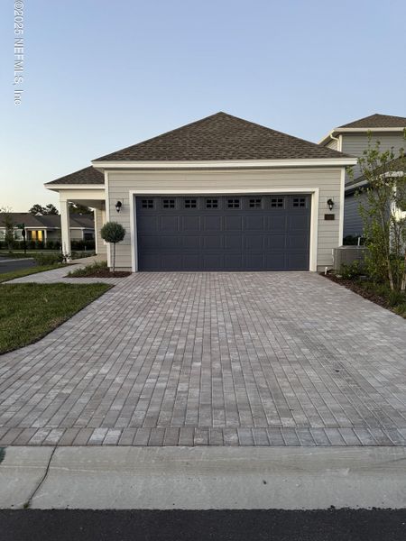 Front exterior of a new home in Brookside at Shearwater, St. Augustine, FL, highlighting curb appeal (Image 2). Front exterior of a new home in Brookside at Shearwater, St. Augustine, FL, highlighting curb appeal (Image 2).