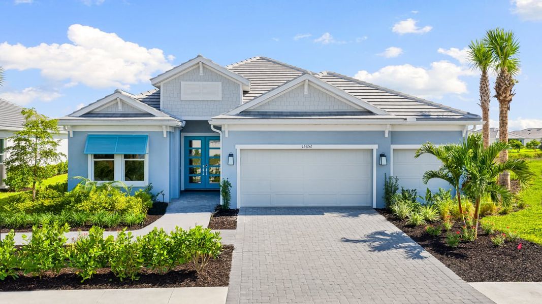 Representative exterior photo of a completed home built from the Pallazio II by Taylor Morrison in Esplanade at Starling, Punta Gorda, FL (Image 1). Representative exterior photo of a completed home built from the Pallazio II by Taylor Morrison in Esplanade at Starling, Punta Gorda, FL (Image 1).