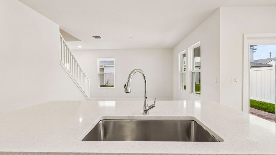 Furnished interior view inside a new home in Cyrene at Harmony, St. Cloud (Image 14).