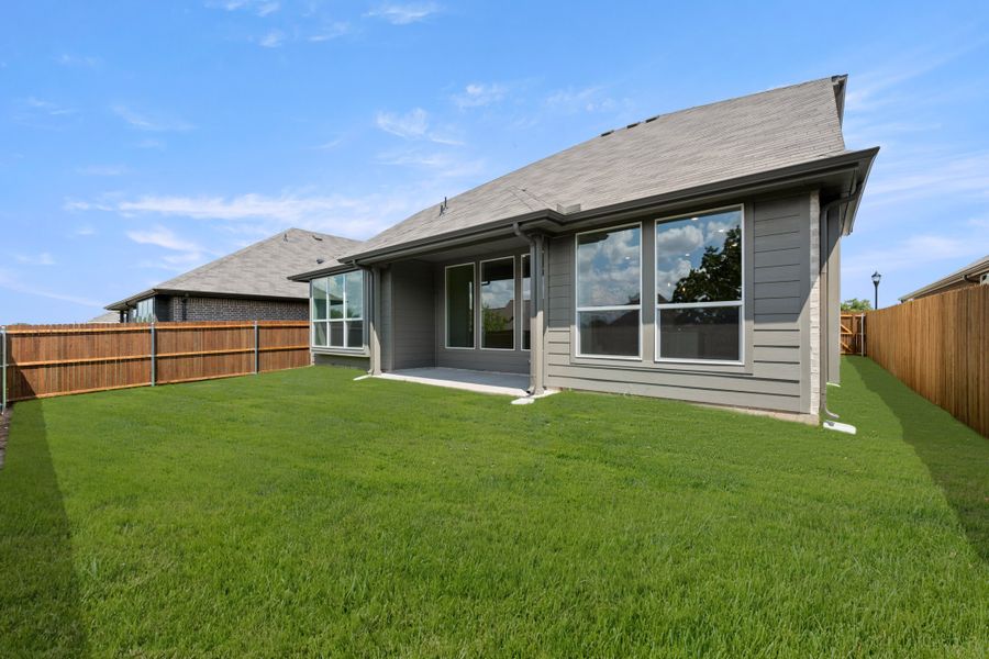 Exterior details and patio area of a home in Pirate Village, Granbury (Image 3).