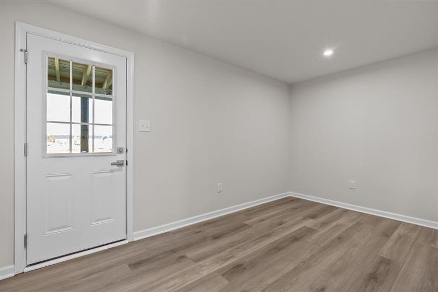 Spacious, unfurnished interior of a new home in South Mills Towns, South Mills (Image 14).