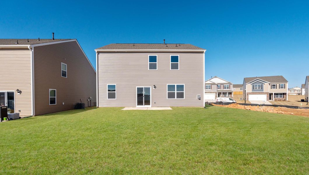 Front exterior of a new home in Hunters Ridge, Woodruff, SC, highlighting curb appeal (Image 2).