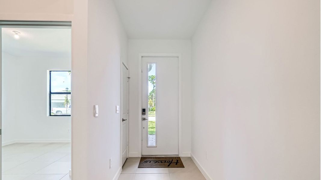 Representative unfurnished interior of a home built from the Cali by D.R. Horton in Twin Oaks, Stuart (Image 11).