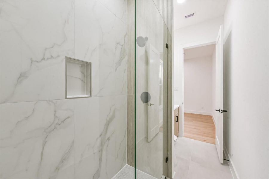 Beautiful standing shower.