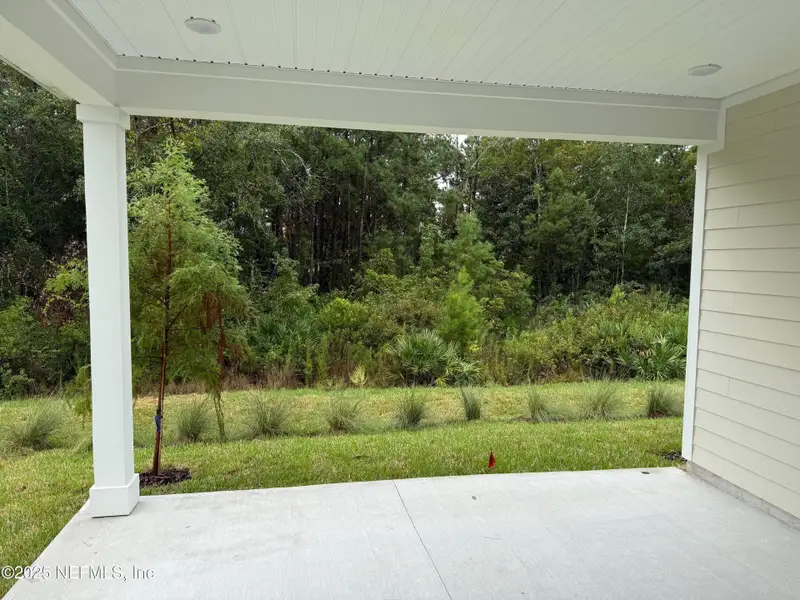 Exterior details and patio area of a home in The Preserve at Concourse Crossing, Fernandina Beach (Image 2).