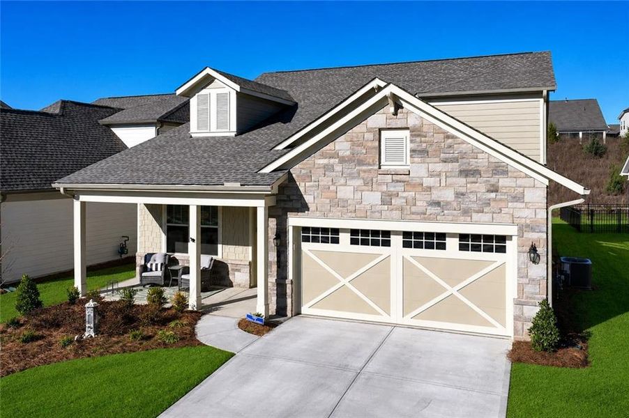 Front exterior of a new home in , Hoschton, GA, highlighting curb appeal (Image 25).