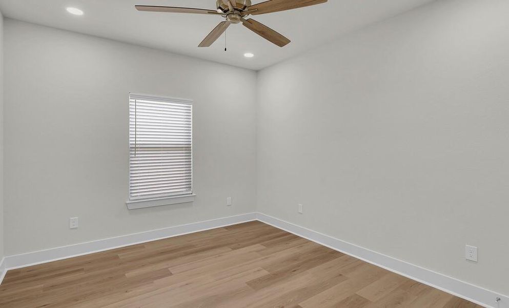 Spare room featuring light wood-style flooring, recessed lighting, and a ceiling fan