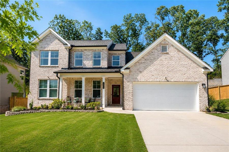 Front exterior of a new home in , Lawrenceville, GA, highlighting curb appeal (Image 26). Front exterior of a new home in , Lawrenceville, GA, highlighting curb appeal (Image 26).