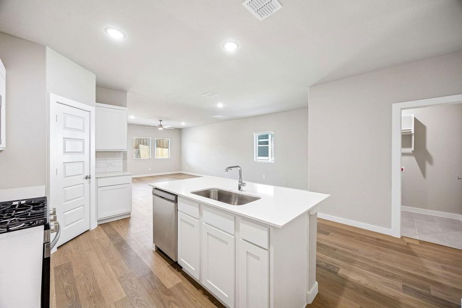 Kitchen in the Willow home plan by Trophy Signature Homes – REPRESENTATIVE PHOTO Kitchen in the Willow home plan by Trophy Signature Homes – REPRESENTATIVE PHOTO