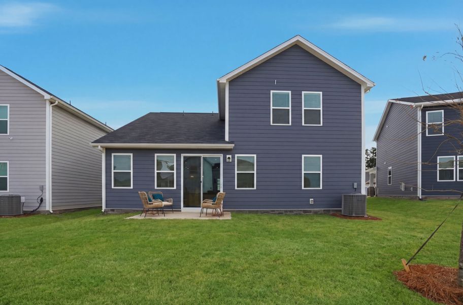 Exterior details and patio area of a home in Waxhaw Landing, Monroe (Image 24).