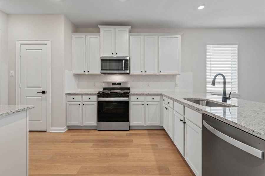 Furnished interior view inside a new home in Emberly, Beasley (Image 5).