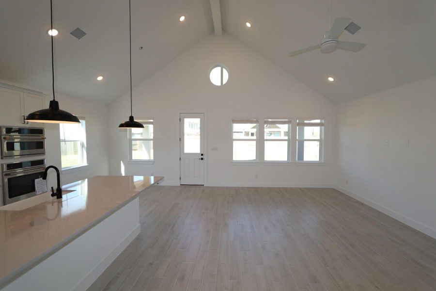 Vaulted ceilings throughout the living area