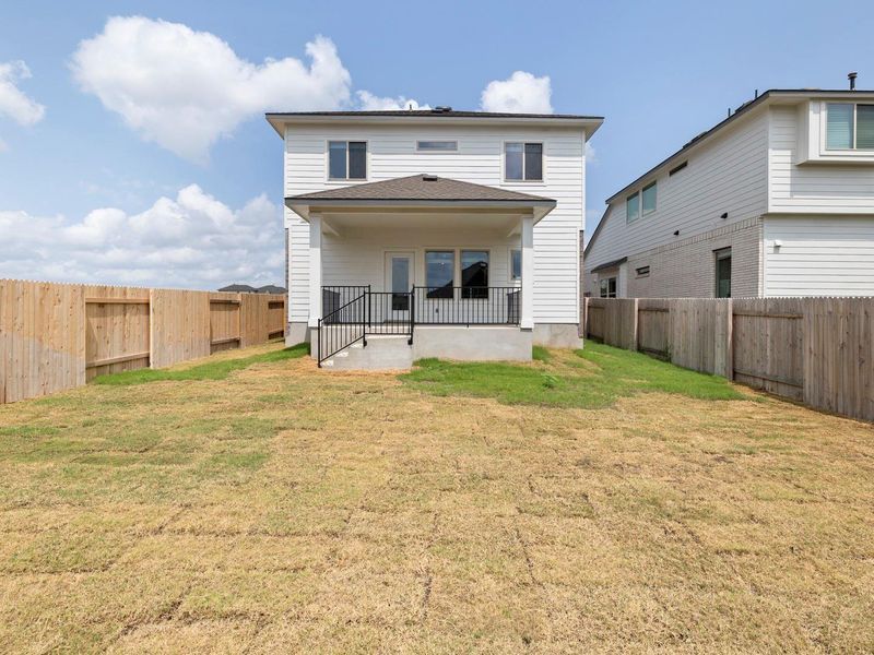 Exterior details and patio area of a home in Crosswinds, Kyle (Image 4).