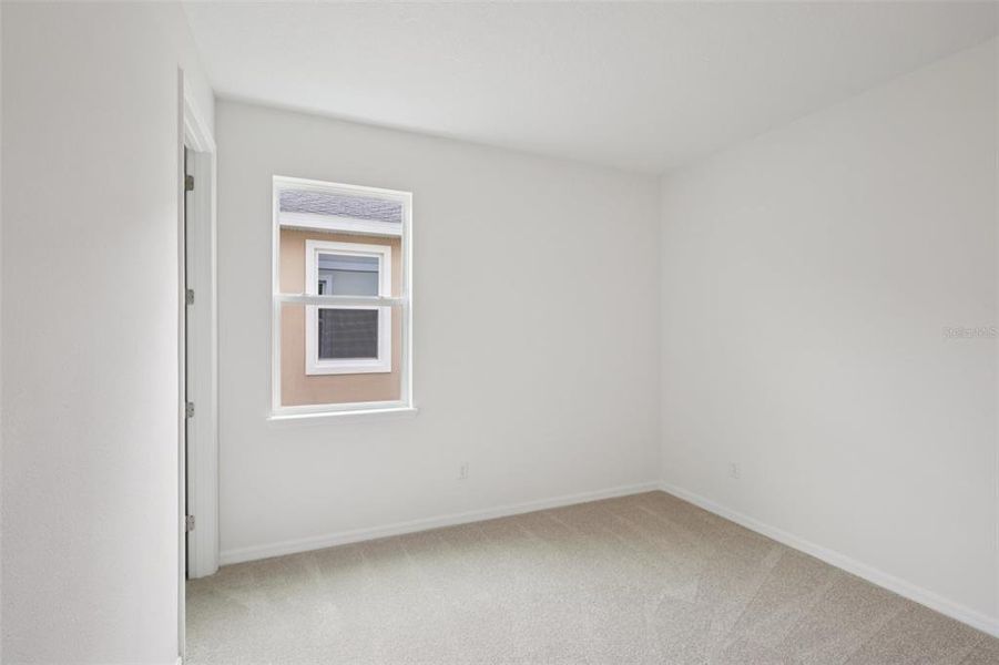 Spacious, unfurnished interior of a new home in Primrose at Longleaf, New Port Richey (Image 49).