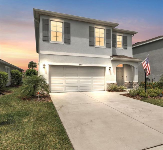 Front exterior of a new home in , Bradenton, FL, highlighting curb appeal (Image 19). Front exterior of a new home in , Bradenton, FL, highlighting curb appeal (Image 19).