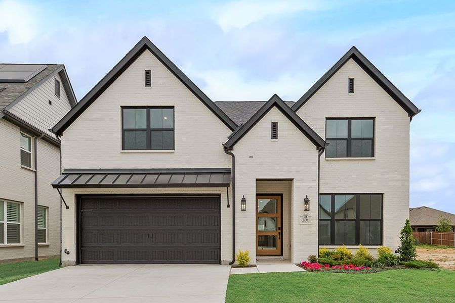 Front exterior of a new home in Tavolo Park, Fort Worth, TX, highlighting curb appeal (Image 1). Front exterior of a new home in Tavolo Park, Fort Worth, TX, highlighting curb appeal (Image 1).