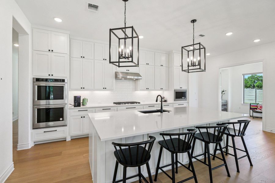 Furnished interior view inside a new home in Wolf Ranch West Bend - 70', Georgetown (Image 6).