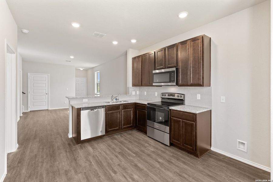 Furnished interior view inside a new home in Blue Ridge Ranch, San Antonio (Image 6).