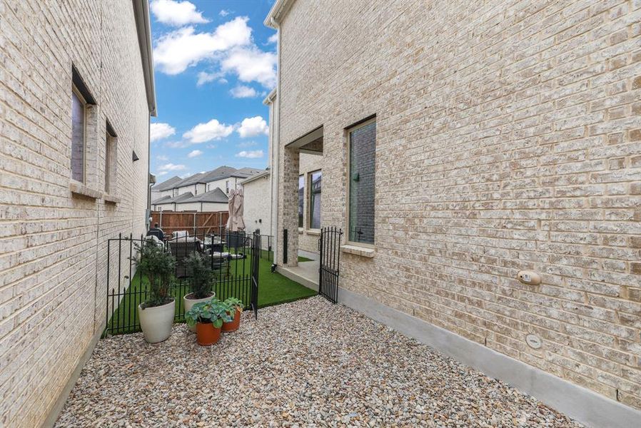 View of side of property with brick siding