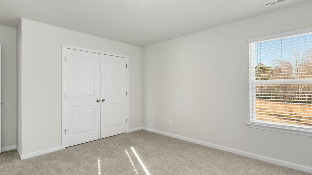 Spacious, unfurnished interior of a new home in The Preserve at Tidewater, Sneads Ferry (Image 38).