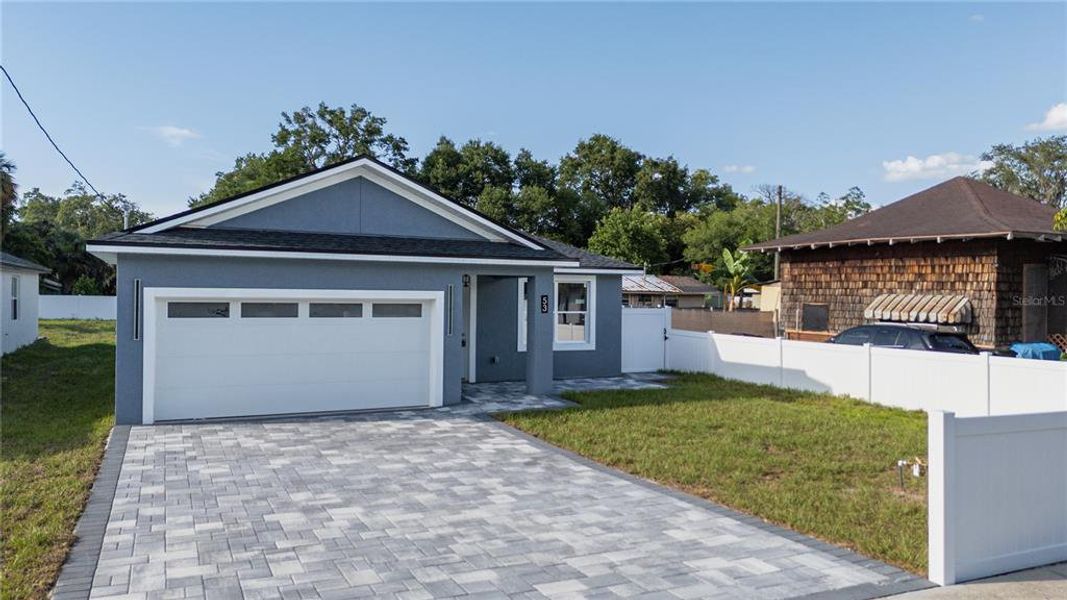 Front exterior of a new home in , Apopka, FL, highlighting curb appeal (Image 2).