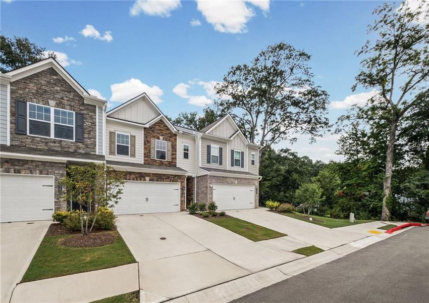 Front exterior of a new home in , Powder Springs, GA, highlighting curb appeal (Image 22).