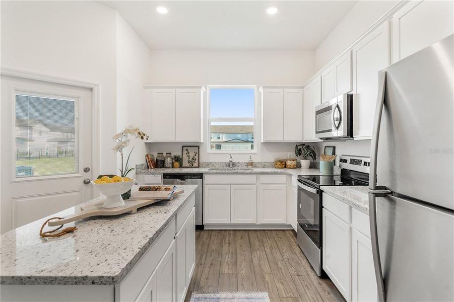 Furnished interior view inside a new home in Sol Vista, Dundee (Image 22).