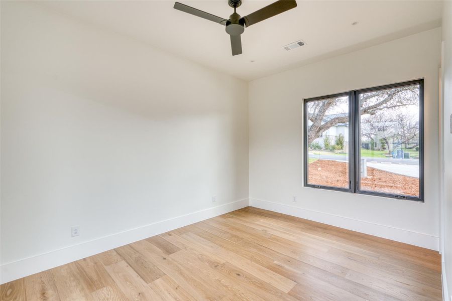 The secondary bedrooms feature en-suite bathrooms and walk-in closets.