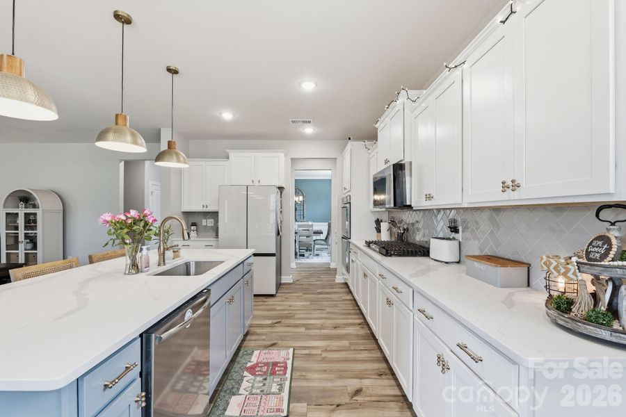 Your perfectly designed gourmet kitchen will be the heart of your new home, centrally located and open to the common living space