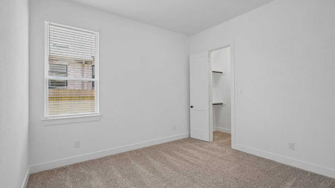 Representative unfurnished interior of a home built from the Oxford by Chesmar Homes in Parkside on the River, Georgetown (Image 16).