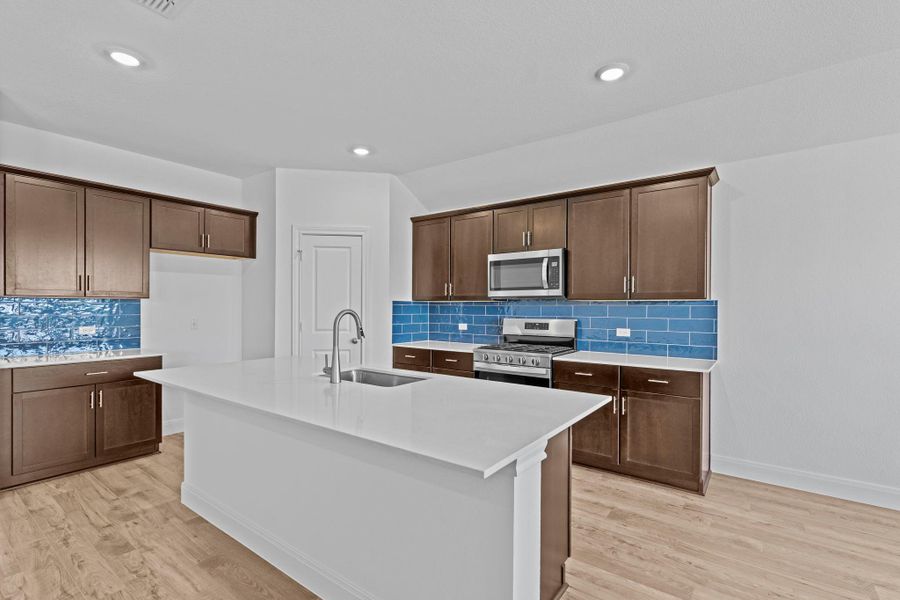 Furnished interior view inside a new home in Railhead, Cedar Creek (Image 10).