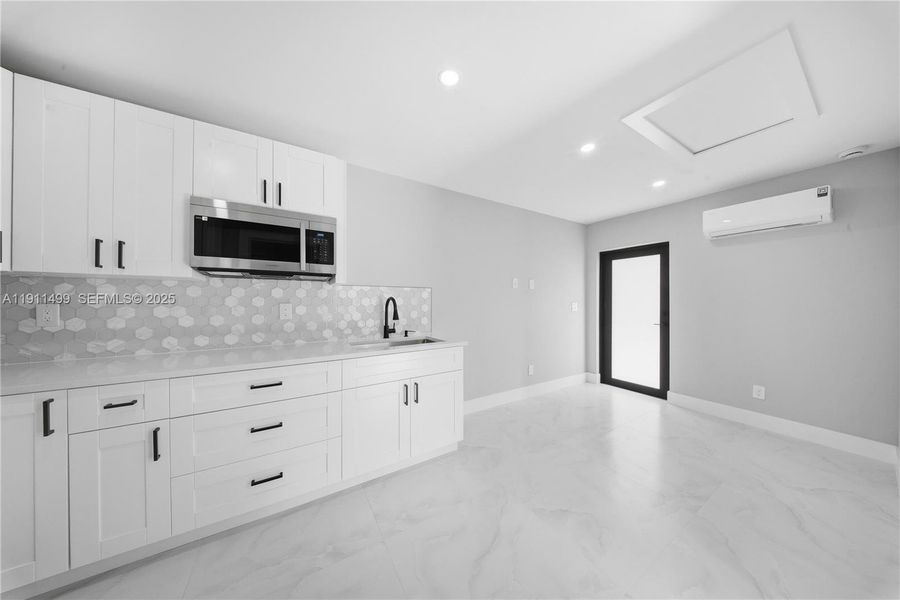 Kitchen with washer and dryer Kitchen with washer and dryer