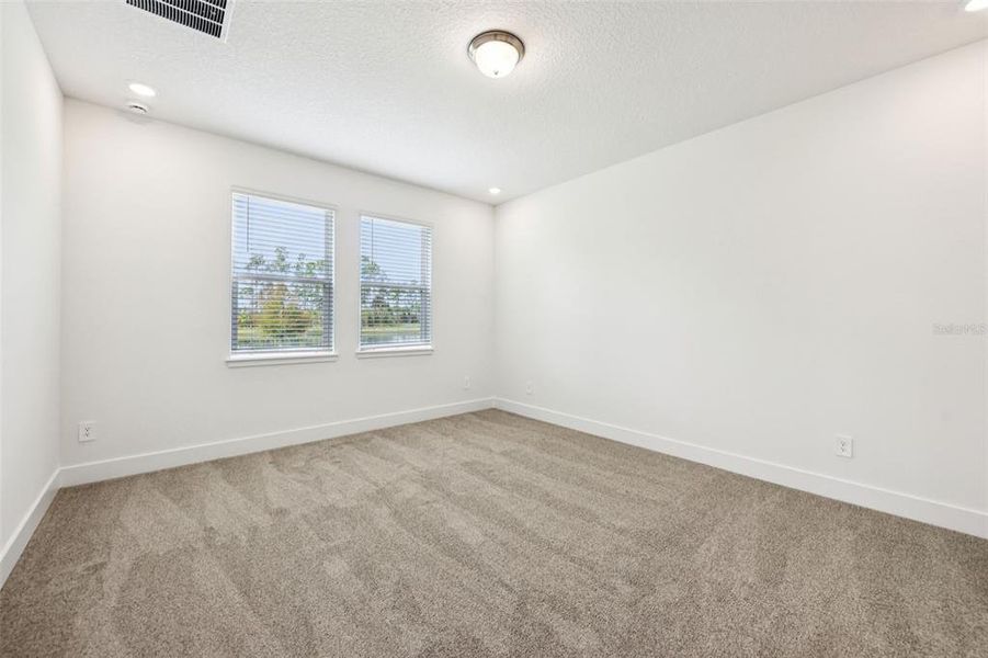 Spacious, unfurnished interior of a new home in Ridgehaven - Signature Series, Ormond Beach (Image 29).