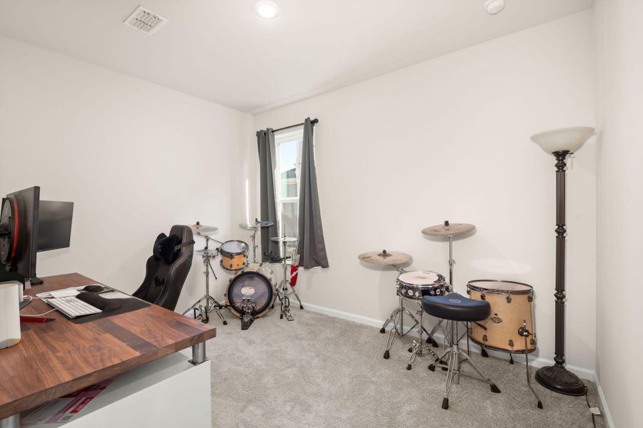 Furnished interior view inside a new home in Jasmine Point at Lakes of Cane Bay, Summerville (Image 15).