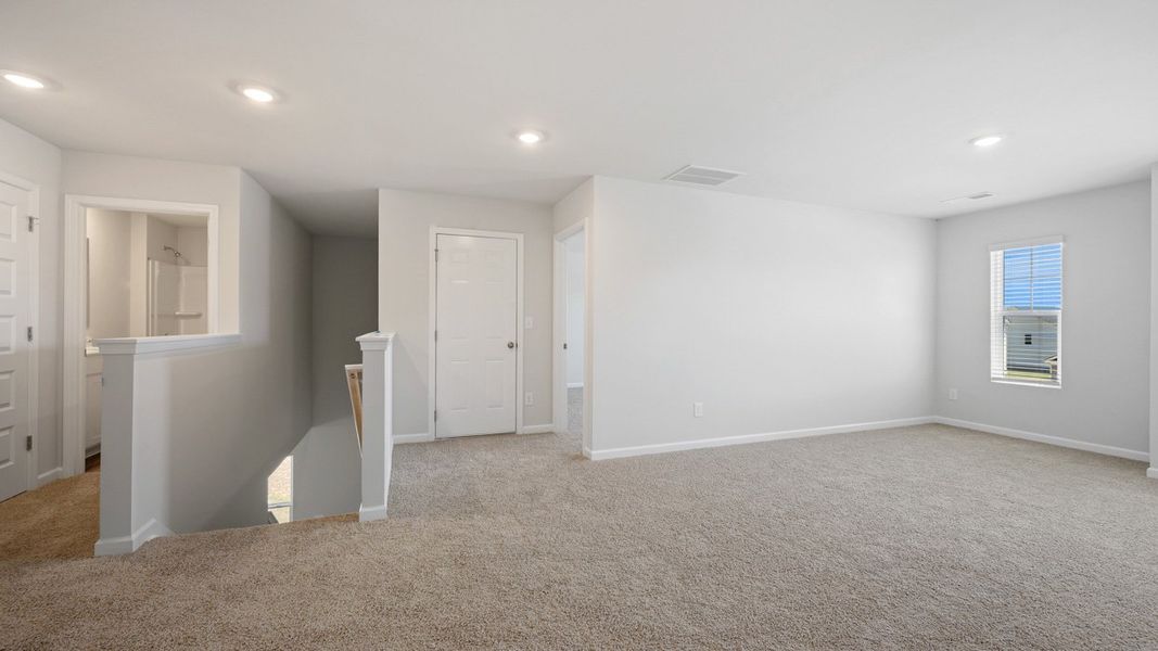 Spacious, unfurnished interior of a new home in Brooks Station, Dacula (Image 23).