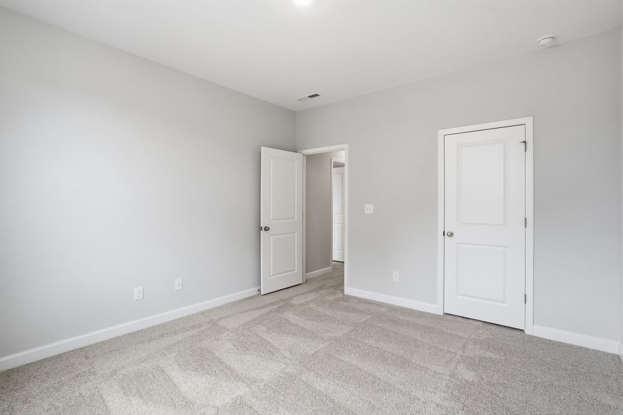 Spacious, unfurnished interior of a new home in Ovation at Sweetbrier, Durham (Image 29).