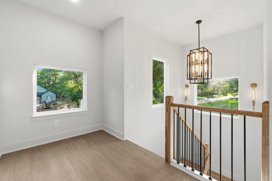 Upstairs landing. This is a universal space to sit and read a favorite book. Upstairs landing. This is a universal space to sit and read a favorite book.
