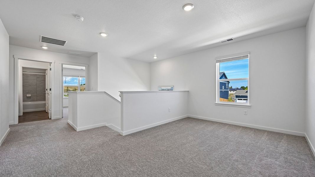 Spacious, unfurnished interior of a new home in Trails at Crowfoot, Parker (Image 15). Spacious, unfurnished interior of a new home in Trails at Crowfoot, Parker (Image 15).