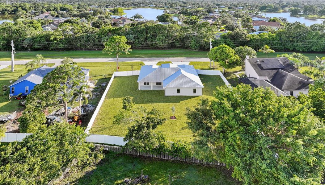 Front exterior of a new home in , Port St. Lucie, FL, highlighting curb appeal (Image 14).