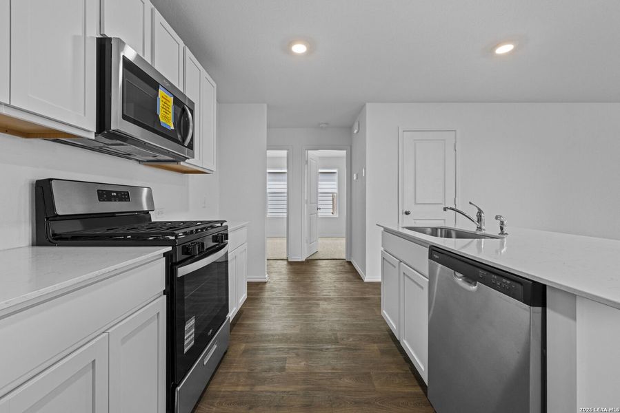 Furnished interior view inside a new home in Avenida, Converse (Image 7).