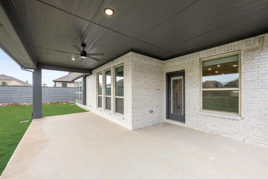 Exterior details and patio area of a home in Union Park Classic 55, Little Elm (Image 21).