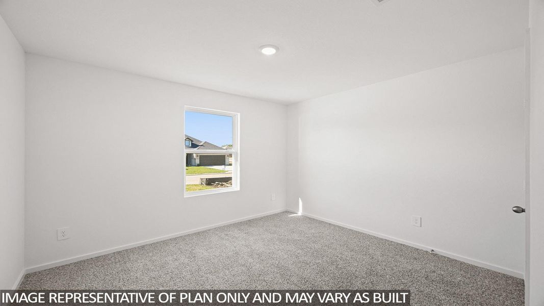 Spare room with carpet floors and baseboards