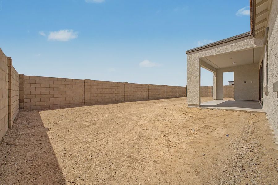 Exterior details and patio area of a home in Valencia at Granite Vista, Waddell (Image 4).