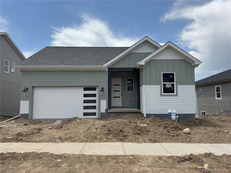 Front exterior of a new home in , Golden, CO, highlighting curb appeal (Image 1).
