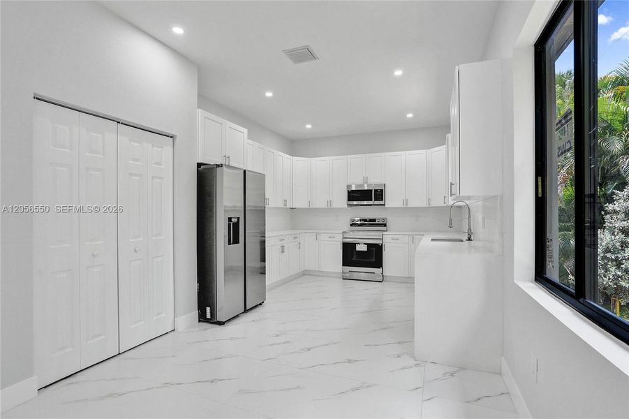Furnished interior view inside a new home in , Fort Lauderdale (Image 7). Furnished interior view inside a new home in , Fort Lauderdale (Image 7).