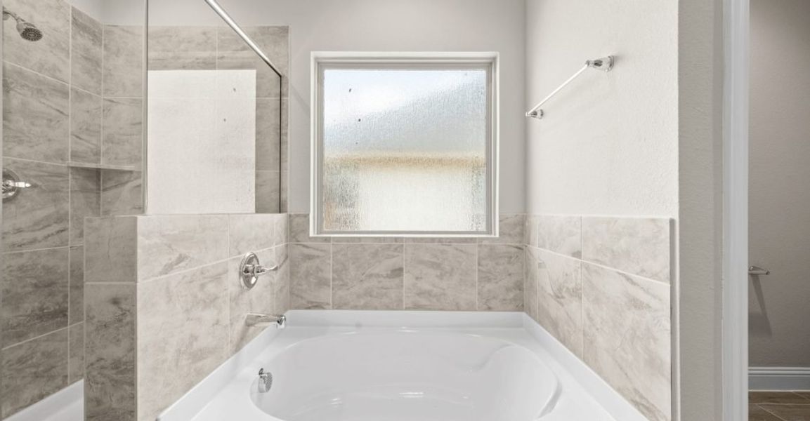 Representative exterior photo of a completed home built from the Donnington by Impression Homes in Still Water Lake, Godley, TX (Image 17).