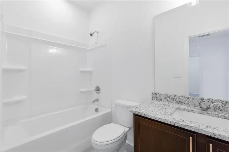 Furnished interior view inside a new home in , Buford (Image 9).
